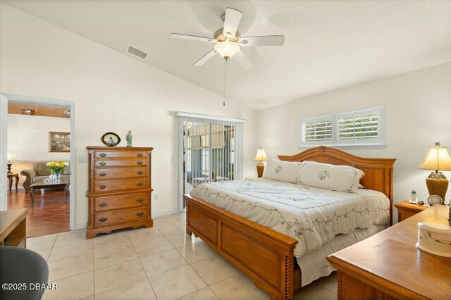 979 Leyburn Dr, Deltona, FL 32725 - bedroom with light tile patterned flooring, visible vents, vaulted ceiling, and multiple windows