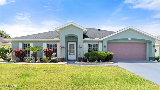 979 Leyburn Dr, Deltona, FL 32725 - ranch-style house featuring stucco siding, a front yard, concrete driveway, and an attached garage