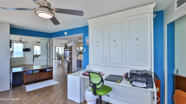 home office featuring hardwood / wood-style flooring