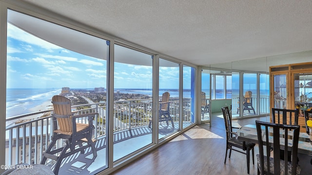 sunroom with a water view