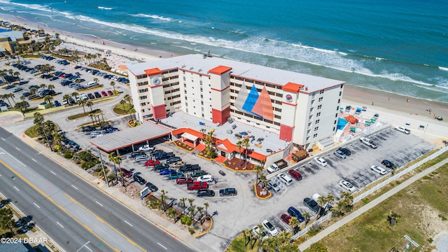 bird's eye view with a beach view and a water view