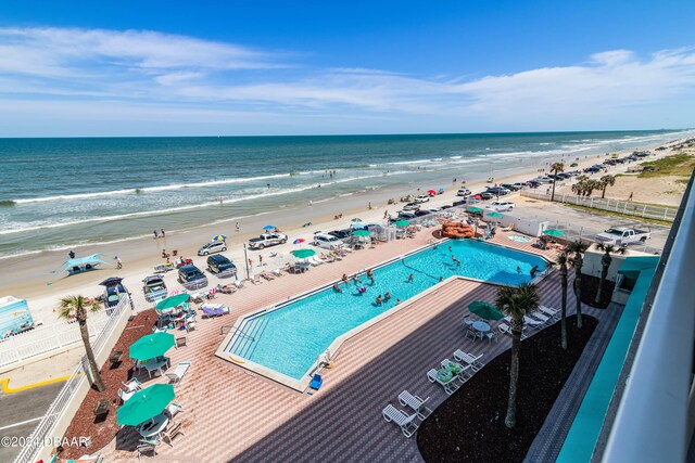 drone / aerial view with a view of the beach and a water view