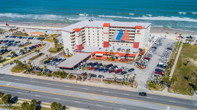 bird's eye view with a view of the beach and a water view