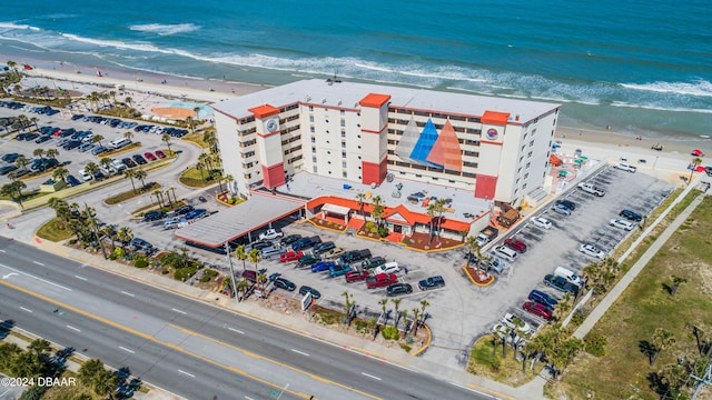 aerial view with a view of the beach and a water view