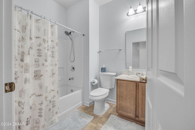 full bathroom with toilet, vanity, and shower / bath combo with shower curtain