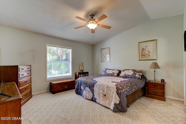 3119 Mango Tree Dr, Edgewater, FL 32141 - bedroom with lofted ceiling, baseboards, carpet, a ceiling fan, and a textured ceiling
