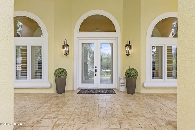 1207 Kaleen Dr, Ormond Beach, FL 32174 - entrance to property with french doors and stucco siding