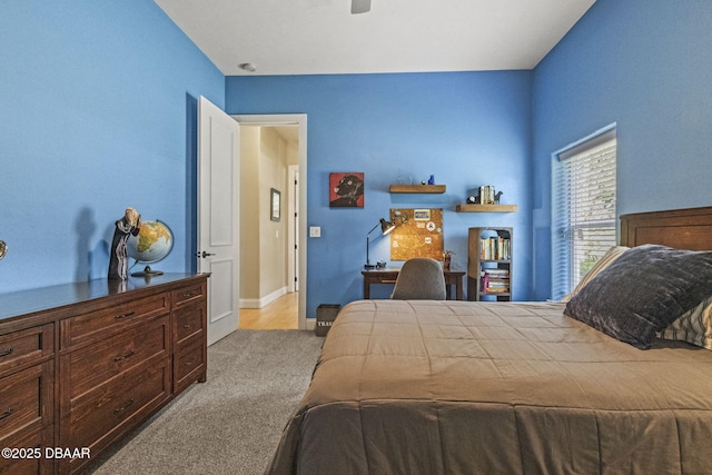 1207 Kaleen Dr, Ormond Beach, FL 32174 - carpeted bedroom with baseboards and a ceiling fan