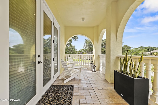 1207 Kaleen Dr, Ormond Beach, FL 32174 - view of patio / terrace featuring french doors