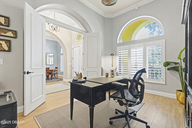 1207 Kaleen Dr, Ormond Beach, FL 32174 - office featuring arched walkways, light wood-type flooring, ornamental molding, and a high ceiling