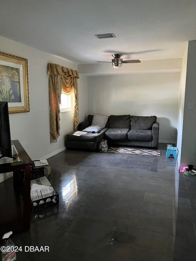 living room featuring ceiling fan