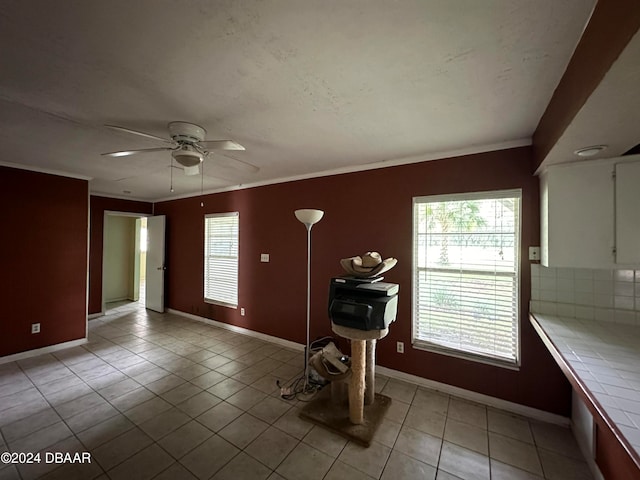 424 Stone Island Rd, Deltona, FL 32725 - interior space featuring ceiling fan, crown molding, and light tile patterned flooring