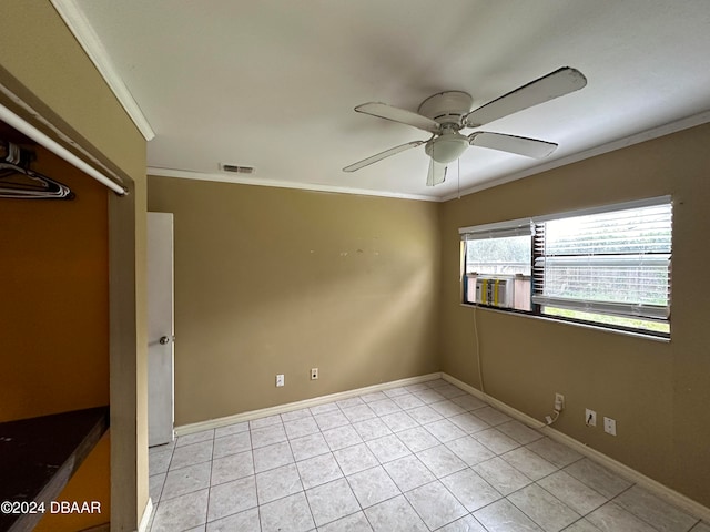 424 Stone Island Rd, Deltona, FL 32725 - tiled spare room with ornamental molding and ceiling fan