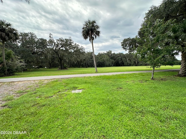 424 Stone Island Rd, Deltona, FL 32725 - view of property's community with a yard