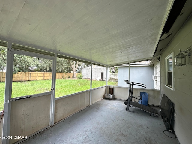424 Stone Island Rd, Deltona, FL 32725 - unfurnished sunroom with lofted ceiling