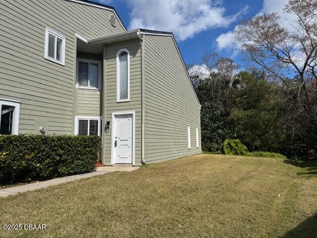 exterior space with a lawn