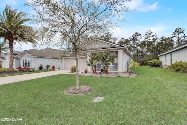 view of front of house featuring a garage and a front lawn