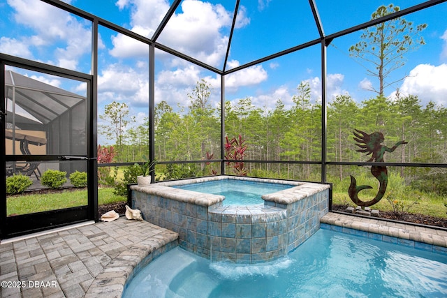 308 Low Tide Ln, Daytona Beach, FL 32124 - view of swimming pool with glass enclosure, a pool with connected hot tub, and a patio