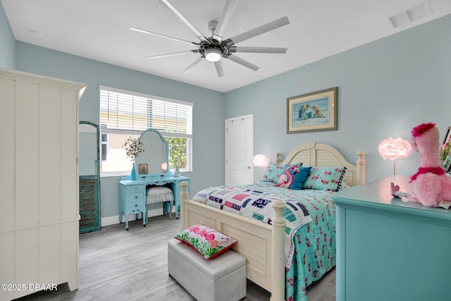 308 Low Tide Ln, Daytona Beach, FL 32124 - bedroom featuring light wood-style flooring and ceiling fan