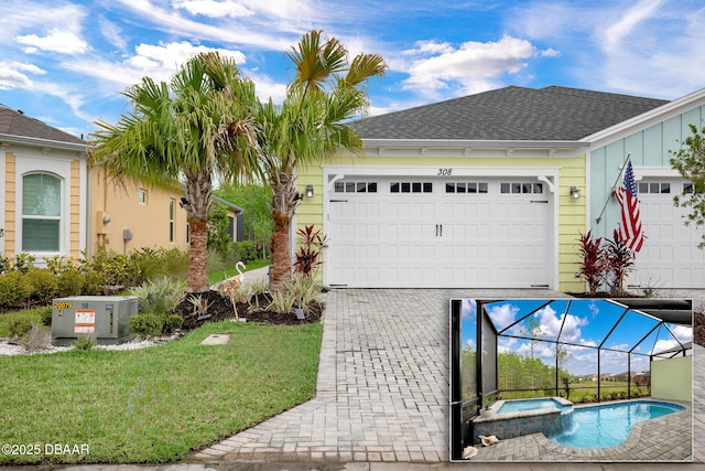 308 Low Tide Ln, Daytona Beach, FL 32124 - view of front of home featuring a garage, board and batten siding, driveway, a front yard, and a pool with connected hot tub