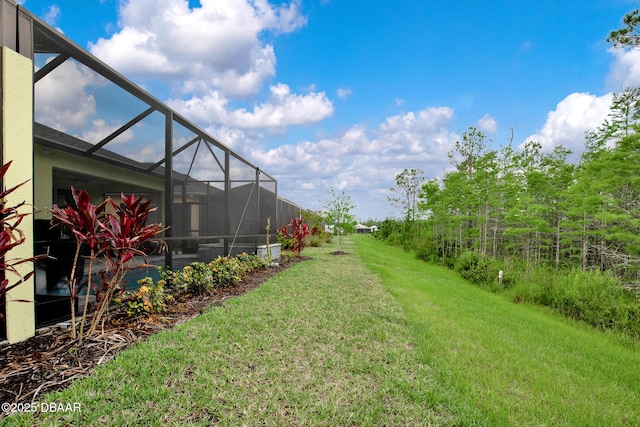 308 Low Tide Ln, Daytona Beach, FL 32124 - view of grassy yard featuring glass enclosure