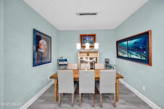 308 Low Tide Ln, Daytona Beach, FL 32124 - dining space with wood finished floors