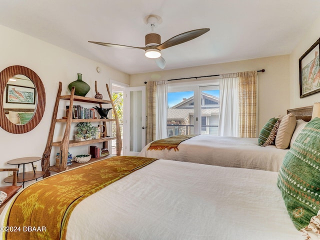 bedroom featuring hardwood / wood-style flooring, access to outside, and ceiling fan