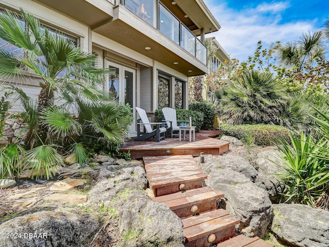 view of patio / terrace featuring a balcony and a deck