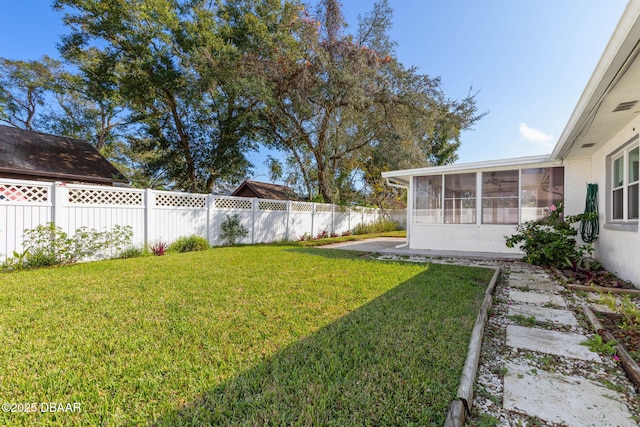 view of yard with a sunroom