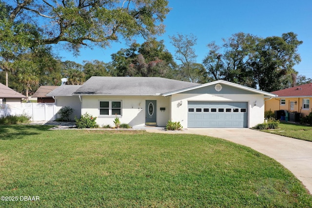 ranch-style home featuring a front yard and a garage