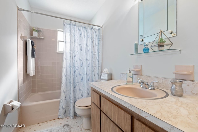 full bathroom featuring tile patterned floors, vanity, toilet, and shower / tub combo