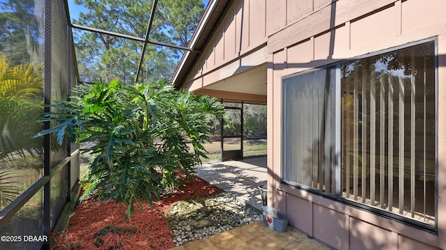 view of side of property with board and batten siding
