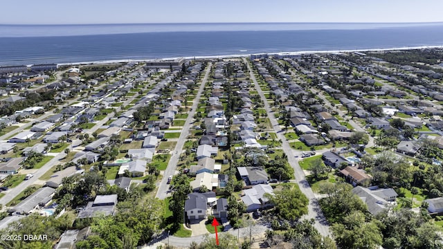 birds eye view of property featuring a water view and a residential view