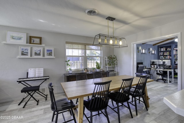 dining room with visible vents