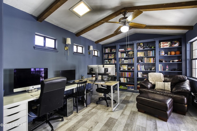 office area featuring vaulted ceiling with beams, a ceiling fan, and wood finished floors