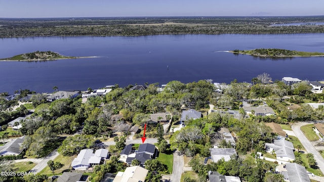 birds eye view of property with a residential view and a water view