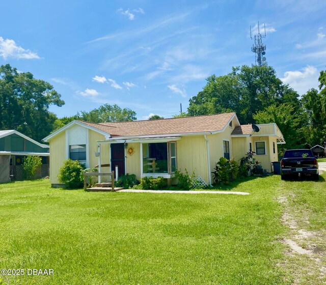 1610 Pioneer Trl, New Smyrna Beach, FL 32168 - single story home featuring a front lawn