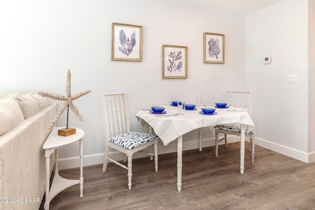 dining room featuring hardwood / wood-style flooring