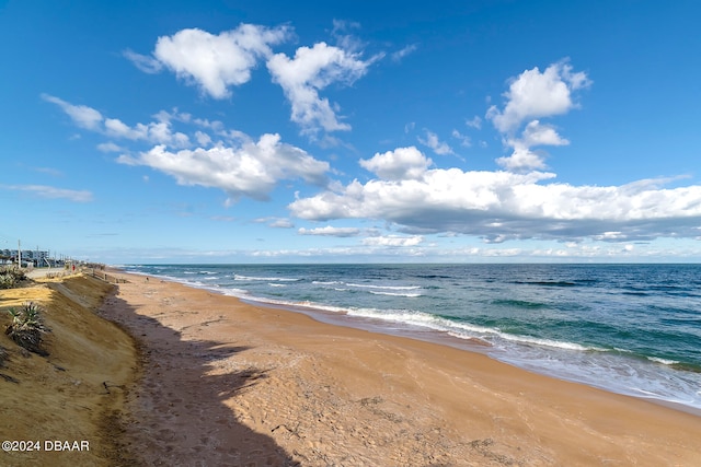 property view of water featuring a beach view