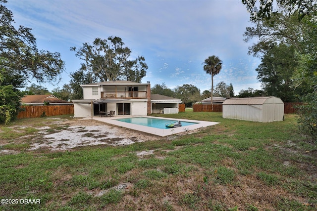 180 Willow Run, Ormond Beach, FL 32174 - back of house featuring a balcony and a patio area
