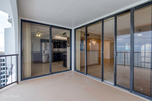 view of patio / terrace with a balcony