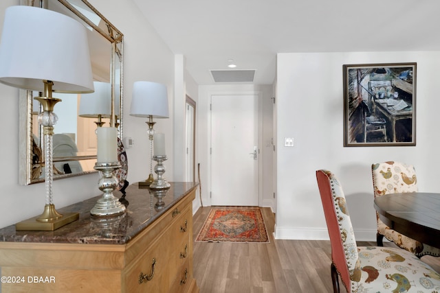 foyer with light wood-type flooring