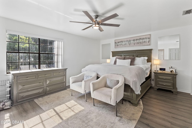 bedroom featuring wood-type flooring and ceiling fan