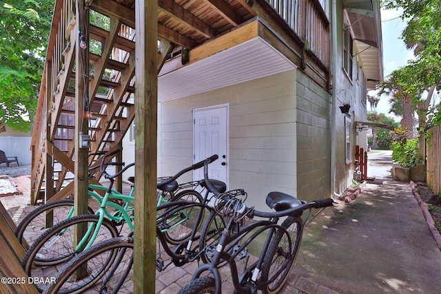 view of patio / terrace with stairs and fence