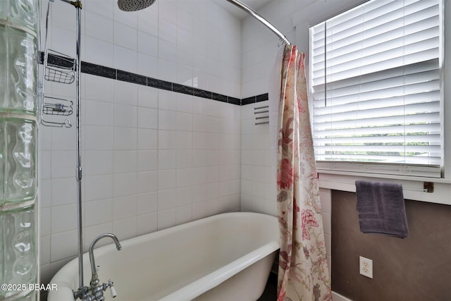 full bathroom with curtained shower and a bathtub