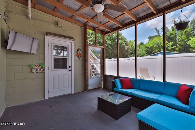 sunroom / solarium with ceiling fan