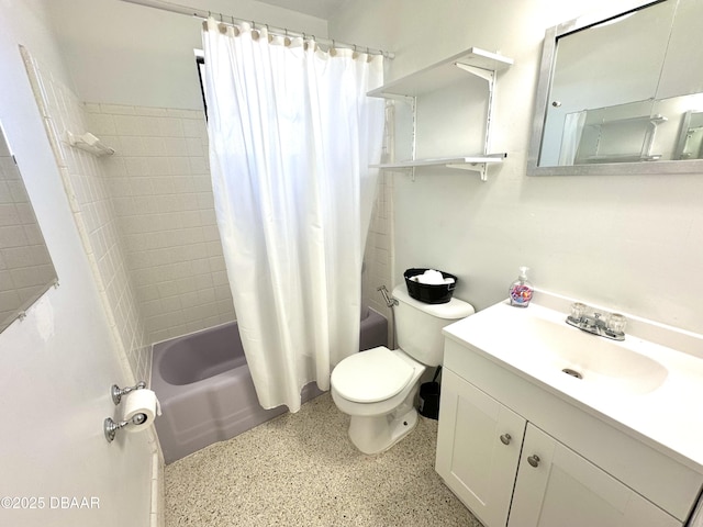 bathroom featuring toilet, shower / bath combo, speckled floor, and vanity