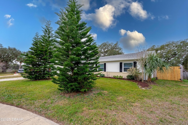 view of home's exterior featuring a lawn