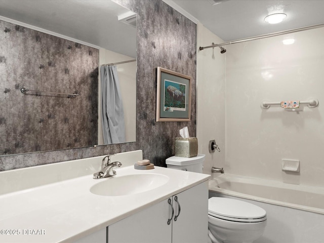 bathroom featuring vanity, toilet, and shower / bath combo with shower curtain