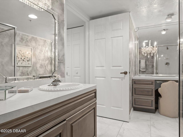 bathroom with vanity and marble finish floor